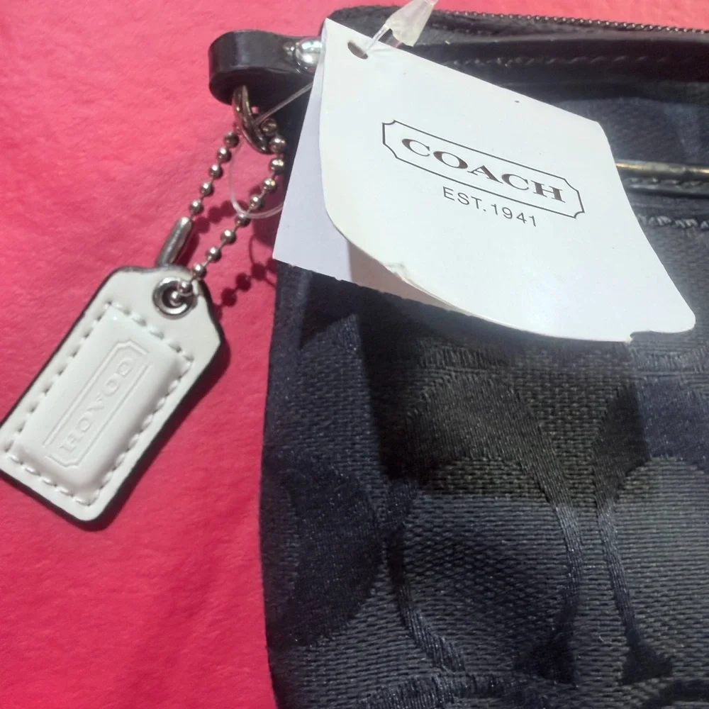 Coach Park Signature Medium Wristlet. PRK SIG MED WRST," which stands for Park - Picture 2 of 4